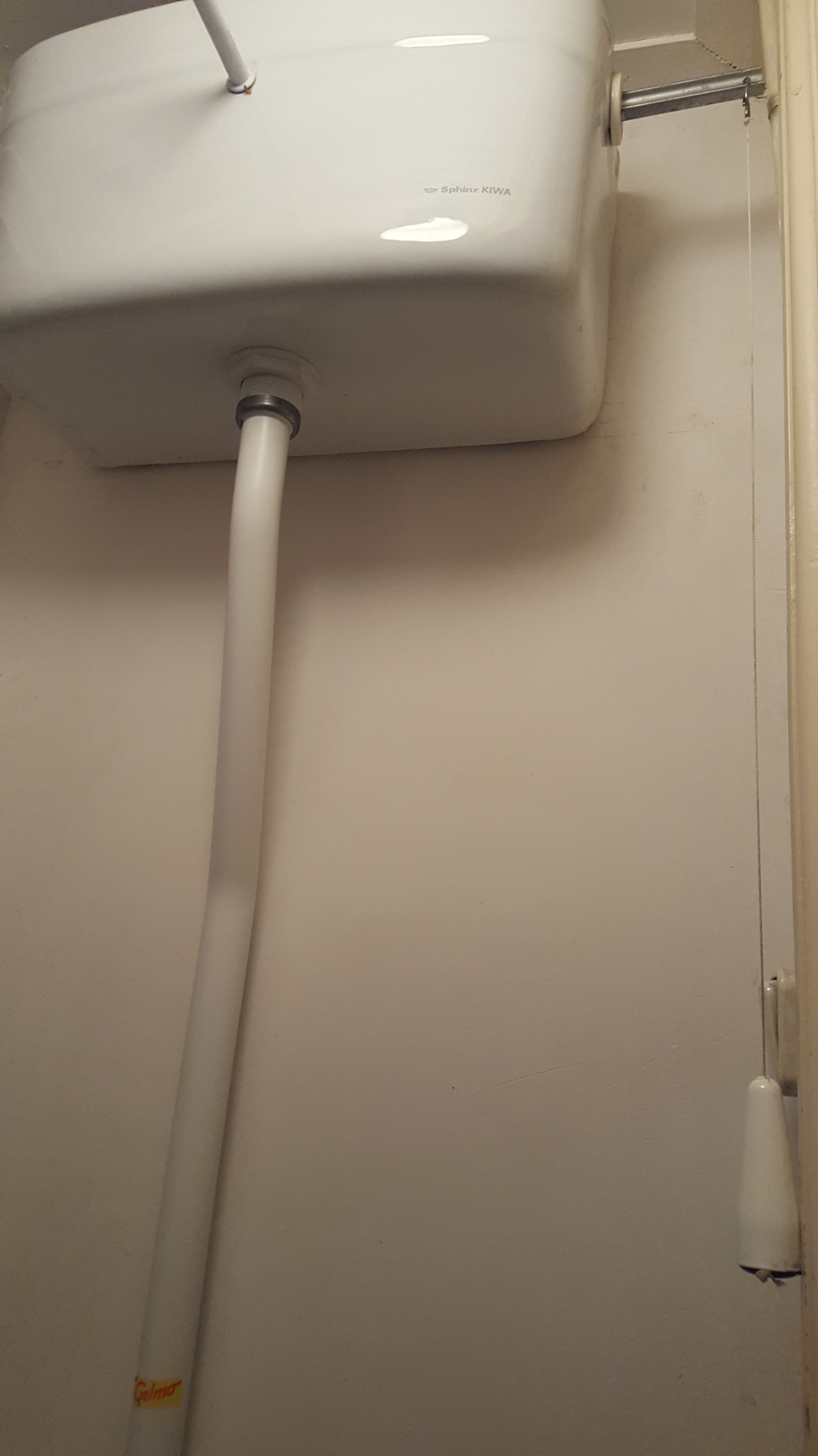 A Dutch toilet with a pulley system to flush