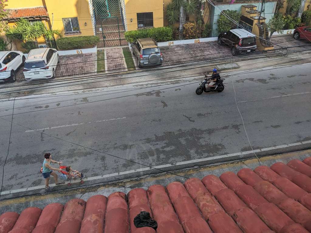 Walking along the road of Avenida 15 in Playa del Carmen