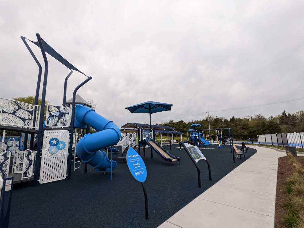 The all abilities inclusive kids play around at the BlueCross Healthy Place playground at the Northwest YMCA in Nashville, one of the best playgrounds in Nashville