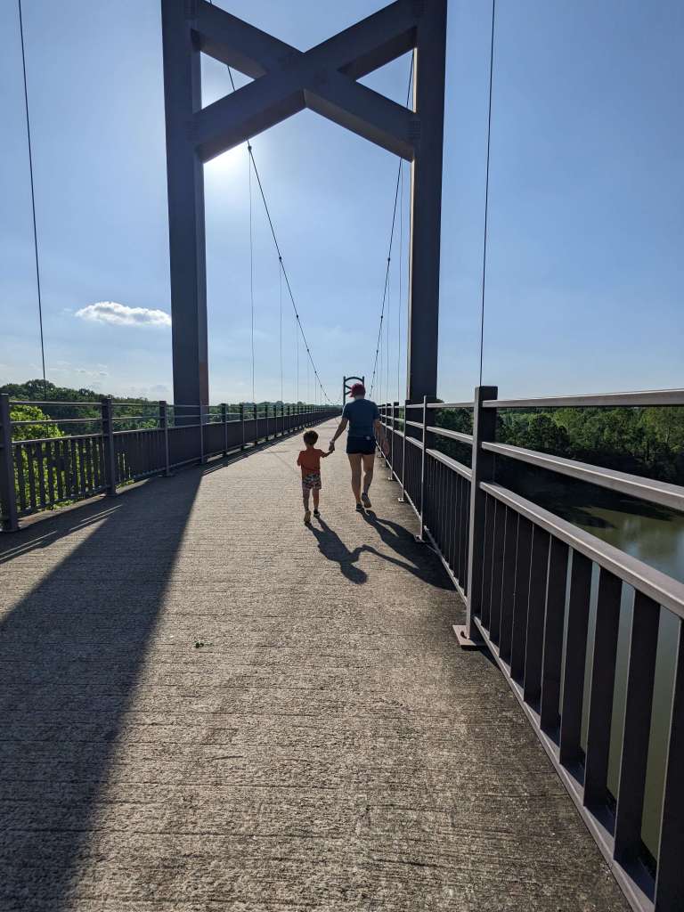We love walking the greenway bridge, which is easy to access from Two Rivers Park