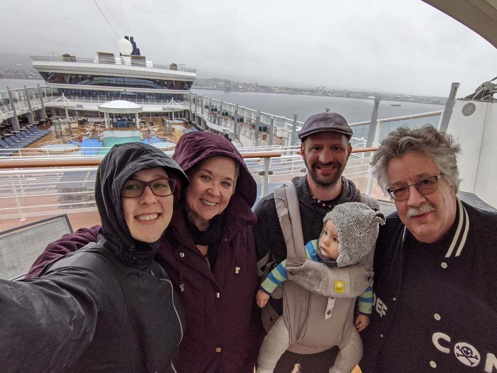 Family traveling with a baby, on a cruise