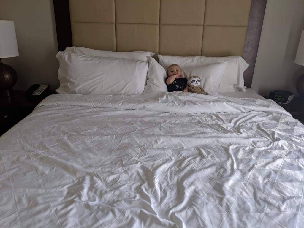 Travel with baby: Baby in hotel bed on first road trip