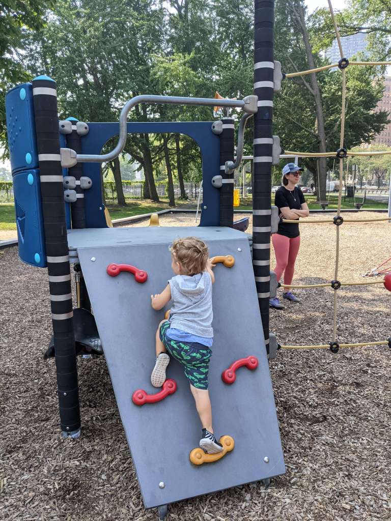 Skyler on the littles playgorund equipment