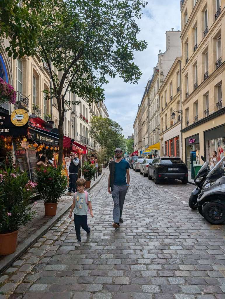 Intentionally wandering around Paris: Dad whispering behind him, "Pay attention to the cars!"