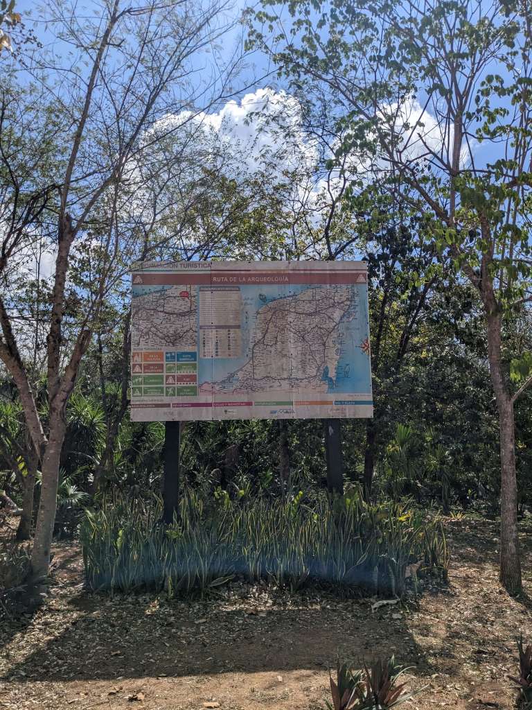 This map of the Ek Balam ruins area is in the parking lot. Follow the path by the map to the main entrance.