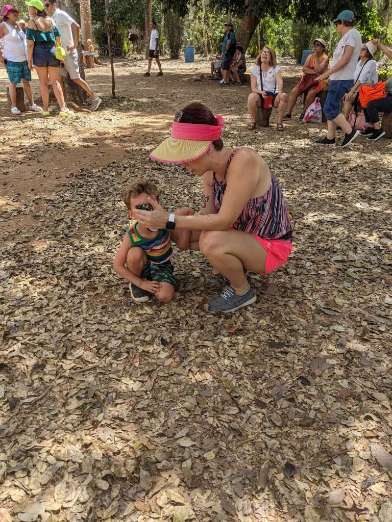 This kid loves looking at the map to see where we are so here I am showing him the map on my phone of Ek Balam